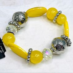 Mixit Beaded Bracelet. Yellow Clear And Silver Beads. New With Tags. All Jewelry Is Costume Unless Otherwise Stated. Yellow Beaded Bracelet For Party, Adjustable Yellow Beaded Bracelet For Parties, Party Bracelets With Colorful Beads In Yellow, Yellow Bracelets With Colorful Round Beads, Yellow Bracelets With Colorful Beads, Yellow Beaded Bracelets With Colorful Round Beads, Elegant Yellow Stretch Bracelet With Round Beads, Elegant Yellow Beaded Bracelet With Faceted Beads, Elegant Yellow Adjustable Beaded Bracelets