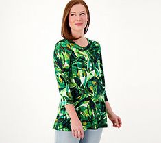 An eye-catching print, a flattering A-line silhouette, and shirring along the sleeves -- what's not to love about this beautiful blouse? Plus, the Liquid Knit® feels oh-so soft and comfy on your skin. From Susan Graver. Fall Printed Tops With 3/4 Sleeves, Casual Printed Top With 3/4 Sleeves, Casual Printed Tops With 3/4 Sleeve, Fitted Floral Print Top With 3/4 Sleeves, Stretch Green Printed Top, Patterned 3/4 Sleeve Tops For Fall, Versatile Floral Print Spring Tops, Printed 3/4 Sleeve Tops, Printed Tops With Relaxed Fit And 3/4 Sleeve