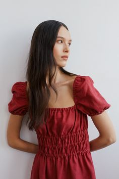 "HOLIDAY is an elegant puff short sleeve linen midi dress.  DETAILS - Puff short sleeve - Elasticated body - Midi length - Oeko-Tex certified 100% local washed midweight linen - Cut and sewn to order just for you in our studio COLOR - Raspberry, you can also choose other colors above - Fabric samples are available here https://www.etsy.com/listing/586569696/linen-fabric-samples SIZING & FIT - Fit true to size - Model is 5'9.5\" / 177cm and wearing a size XS CARE FOR LINEN - Machine wash up to 30ºC/86ºF gentle cycle - Lay flat to dry or tumble dry low - Warm iron if needed - Do not bleach SIZE GUIDE Size conversion guide Size XS (US 0-2, IT 36-38, UK 4-6, Japan 3-5, France 32-34) Size S (US 4-6, IT 40-42, UK 8-10, Japan 7-9, France 36-38) Size M (US 8-10, IT 44-46, UK 12-14, Japan 11-13, Fr Summer Smocked Bodice Puff Sleeve Top, Summer Puff Sleeve Top With Smocked Bodice, Puff Sleeve Top With Smocked Bodice For Day Out, Solid Color Summer Puff Sleeve Top, Summer Ruched Puff Sleeve Short Sleeve Dress, Puff Sleeve Top With Gathered Short Sleeves, Summer Ruched Puff Sleeve Dress With Short Sleeves, Solid Color Puff Sleeve Top With Gathered Sleeves, Solid Puff Sleeve Top With Gathered Sleeves