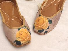 * Adorable yellow floral print flat shoes as shown above. * comfortable in wear. * Perfect for every occasion. * best in quality. * Handmade by me. * Material: Upper (Cloth) ; Lower (Leather) Please chose your size from the below chat. If you are not sure about your size, please let us know.We ll help you out. Sizes: - US 4.5 - EU 34 - 22.5 cms - US 5 - EU 35- 23cms - US 6 - EU 36- 23.5 cms - US 7- EU 37- 24 cms - US 7.5- EU 38- 24.5 cms - US 8.5- EU 39- 25 cms - US 9- EU 40- 25.5 cms - US 10- E Festive Spring Slip-on Flats, Spring Festive Slip-on Flats, Festive Slip-on Flats For Spring, Floral Flat Shoes, Women Shoes Flats, Boho Headpiece, Shoes Ballet Flats, Flower Flat, Gold Ballet Flats