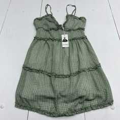 Angashion Green Ruffle Square Print Sleeveless Dress Women’s Size Medium. Condition Is New With Tags See Pics Ls322/22 J3 Lh27 Green Sleeveless Mini Dress With Ruffles, Green Mini Sleeveless Dress With Ruffles, Sleeveless Ruffled Dress With Spaghetti Straps For Brunch, V-neck Ruffled Sleeveless Dress For Day Out, Sleeveless Summer Mini Dress With Ruffle Hem, Chic Green Sleeveless Dress With Ruffles, Chic Sleeveless Vest Dress For Spring, Chic Sleeveless Dress For Spring, Green Ruffled Straps Sundress For Summer