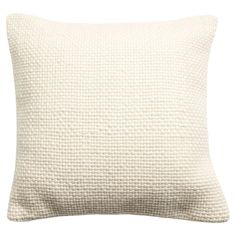 a white pillow that is made out of knitted fabric and has a square shape