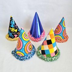 Vintage Set of 5 Cardboard Kids Fringed Party Hats, assorted patterns and colors.  Please judge condition by pictures, like they say a picture is worth a thousand words. Country of Origin: USA Maker/Designer: No makers mark Measures Approx: 7" Condition:  Items are sold in as is condition. Various signs of wear, creases, bends, scratches, tears and some discoloration. The elastics are not very stretchy. NO RETURNS OR EXCHANGES But please contact me if you have any issues with your order Remember Cardboard Kids, Kids Fringe, Colors And Patterns, 5 Kids, Vintage Hats, Vintage Party, Party Hat, Black Spot, Hats Vintage