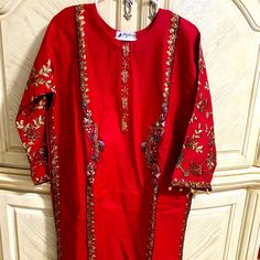 2 Pieces Dress With Sequences Embriodery Elegant Red Dresses For Festivals, Red Floral Embroidered Sets For Eid, Elegant Red Embroidered Dress For Eid, Red Festive Dress For Festivals, Elegant Red Dress For Eid, Festive Red Set With Floral Embroidery, Festive Red Sets With Floral Embroidery, Eid Festive Dresses With Gold Embroidery, Red Embroidered Long Sleeve Dress