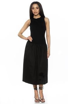 A gathered drop-waist skirt creates the glam silhouette of a sleeveless dress with sporty work-to-weekend versatility. 51 1/2" length (size X-Small) 100% cotton Machine wash, line dry Imported Sleeveless Voluminous Dress With Gathered Skirt, Black Skirted Dress With Gathered Skirt, Black Ruched Sleeveless Midi Dress, Black Midi Dress With Gathered Skirt, Black Dress With Gathered Skirt, Black Dress With Voluminous Skirt, Chic Black Dress With Gathered Skirt, Sleeveless Midi Dress With Gathered Skirt For Daywear, Black Sleeveless Dress With Gathered Skirt