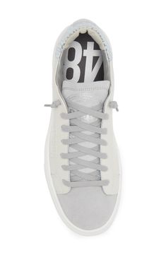 An iconic logo perforates the side of this low-top sneaker set on a platform sole and elevated with flat laces and a tonal finish. Lace-up style Leather upper and lining/rubber sole Made in Italy Athleisure Sneakers With Perforated Toe Box For Streetwear, Platform Sneakers With Perforations For Sports, Low-top Perforated Sneakers For Streetwear, Urban Sneakers With Perforations For Streetwear, Urban Perforated Sneakers For Streetwear, Sporty Platform Sneakers With Perforations, Sporty Platform Sneakers With Perforations For Sports, Sporty Low-top Sneakers With Perforations, Sporty Custom Low-top Sneakers With Perforations