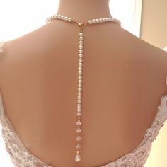 Separable Backdrop Pearl Necklace in Rose Gold, wear it with or Without the Backdrop The jewelry you use on your wedding day should be worn again and again. Sometimes with a backdrop necklace, it may not be the best suited to wear a backdrop necklace with your formal or occasion outfits. That's why we have created a pearl necklace with a separable backdrop. Wear your wedding necklace with or without a backdrop to perfectly suit your style on every occasion with every outfit. This beautiful rose Elegant Single Strand Bridal Necklace For Wedding, Elegant Pearl White Backdrop Necklace, Elegant Pearl Bridal Necklace For Wedding, Elegant Pearl Chain Bridal Necklace, Elegant Pearl Backdrop Necklace With Pearl Drop, Elegant Pearl Charm Bridal Necklace For Wedding, Elegant Single Strand Necklace For Wedding, Elegant Pearl Backdrop Necklace For Formal Occasions, Adjustable Single Strand Pearl Necklace For Wedding