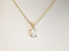 "OPAL NECKLACE FOR WOMEN It's In the Details ✦ All 14k gold filled or sterling silver chain and components ✦ White lab opals ✦ Pendant is 5x7mm with gold filled or sterling silver pendant setting ✦ Shown at 18\" Length ✦ Comes in our pretty white gift box" Formal Gold Ethiopian Opal Jewelry, Formal Ethiopian Opal Gold Jewelry, Dainty Opal Necklace, Solid Gold Jewelry, Opal Pendants, Opal Necklace, Dainty Jewelry, October Birth Stone, Dainty Necklace