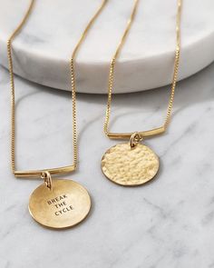 Celebrate your unique journey with our Signature Hammered Coin Necklace, crafted for those who live with intention. The 3/4'' hammered coin is attached to a distinctive curved bar, creating a look that's both intentional and elegant. Engrave a phrase that inspires and supports you through every step of your growth and healing. This hand-hammered charm is a daily reminder to honor your true self, embracing both your strengths and imperfections. Made with premium 14k gold-filled or .925 sterling s Cheap Stamped Gold Necklaces, Everyday Hammered Round Disc Coin Necklace, Everyday Hammered Coin Necklace With Round Pendant, Hammered Round Brass Coin Necklace, Hammered Brass Coin Necklace, Empathy Cards, Live With Intention, Growth And Healing, Branding Inspo