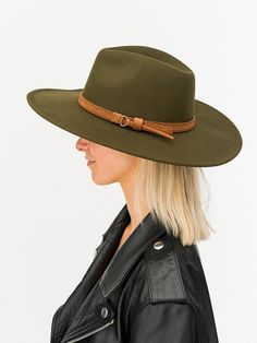 "must have hat in a stunning Olive color adorned with a brown Suede ribbon. Great combo. One of a kind. Perfect for complimenting your outfits and keeping your hair looking good in the wind. 24\" circumference - fits most heads comfortably 4\" brim" Khaki Cap For Fall, Adjustable Wide Brim Top Hat For Fall, Green Brimmed Fedora For Fall, Green Brimmed Felt Hat For Fall, Brown Wide Brim Top Hat For Country Events, Green Flat Brim Felt Hat For Fall, Adjustable Wide Brim Green Felt Hat, Brown Brimmed Boater Hat For Fall, Green Short Brim Felt Hat For Fall