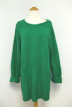 A beautiful true vintage rich green color 100% cotton sweater, tagged women's size M. This gem of a sweater has texture and is a medium weight, not bulky. The sweater  is long and oversized, and could fit a size small, medium or large depending on how oversized you like your sweaters. It's soft and in fantastic condition! **PLEASE Note, the black cinch belt is NOT included. I just wanted to show how nice this sweater will look belted with the sleeves rolled up! **  ** Label: Sweet Green Long Sleeve Knit Sweater, Oversized Green Long Sleeve Sweater, Oversized Green Sweater For Winter, Oversized Green Sweater For Fall, Winter Green Oversized Sweater, Green Winter Sweater Dress, Vintage Green Oversized Sweater, Green Knitted Sweater Dress For Winter, Green Knit Sweater Dress For Winter