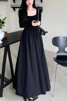 A sophisticated maxi dress with long sleeves and a square collar, designed for elegance and comfort. Ideal for both casual and formal events. Details: Silhouette: A-Line Neckline: Square Collar Decoration: None Material: Polyester Closure Type: Zipper Size (IN) Length Sleeve Bust Waist Shoulder S 47.2 22.4 31.5 25.2 13.4 M 47.6 22.8 33.1 26.8 13.8 L 48.0 23.2 34.6 28.3 14.2 XL 48.4 23.6 36.2 29.9 14.6 Modest Black Dress, Maxi Dress With Long Sleeves, A Line Maxi Dress, Dress With Long Sleeves, Sleeve Maxi Dress, Long Sleeve Maxi, Chorus, Long Sleeve Maxi Dress, Black Maxi Dress