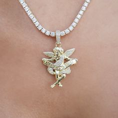 Introducing the Iced Cherub Angel Pendant in 18k Yellow Gold, an exclusive piece crafted with intricate detail. Featuring a cherub adorned with hand-set stones, the angel carries a 'Memento Mori' Latin script that serves as a reminder to live everyday like it could be your last. Pair it with the 4mm Rope Necklace in Yellow Gold for the perfect set that will reflect light with every movement! This product is guaranteed for life - GLD will repair the item should you experience any defects in craft Latin Script, Cherub Angel, Angel Pendant, Vermeil Jewelry, Custom Earrings, Rope Necklace, The Angel, Memento Mori, Pendant Bracelet