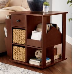 a wooden table with baskets and books on it