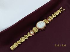 Beautiful golden watch with round dial decorated with ruby stones and available in 2.4 and 2.6 sizes. Rose Gold Diamond Watch For Wedding, Golden Watch Women, Charm Bracelet Watch, Golden Watch, New Gold Jewellery Designs, Gold Plated Watch, Antique Watch, Gold Watches, Antique Jewellery Designs