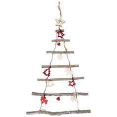 a christmas tree made out of branches with red and white stars hanging from the top