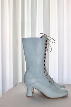 "Gorgeous Victorian style Boots, individual boot execution. Custom boots for narrow feet , wider feet and strong calf also. Beautiful Victorian High Heel Boots . All materials very qualitative. Light Blue/ Sea foam colour leather / Jade leather withe suede leather inside Are issued by limited series. Model inspired from 1900 boot style. The specified sizes are European Mid calf height: height of the heel 2.6 \"inch/ 7 cm length of the boot from the bottom of the sole (at the heel) to the top 10\ Blue Lace Boots, Blue Lace-up Formal Boots, Blue Lace-up Boots With Reinforced Heel, Blue Closed Toe Formal Boots, Elegant Blue Heeled Boots For Formal Occasions, Formal Blue Closed Toe Boots, Elegant Blue Formal Heeled Boots, Fitted Blue Almond Toe Boots, Elegant Blue Almond Toe Boots