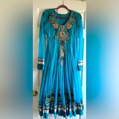 Beautiful And Elegant Dress Very Neatly Stitched. Classy Work And Style As Shown In The Pictures Material Net Size Medium Has Space Inside You Can Make It Bigger Size If You Want No Return Not Exchange Indian Long Dress, Elegant Dress, Big Size, Make It, Long Dress, Pajamas, Size Medium, Women Shopping, Blue