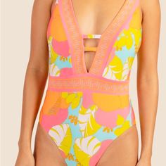 Trina Turk (Swim & Spa Collection) - Playa De Flor Plunge Maillot One Piece Swimsuit - Sz 14 - Multicolored - New Vibrant Pink Printed Swimwear, Pink V-neck Tankini For Swimming, Pink V-neck Beachy Swimwear, Pink One-piece Tropical Tankini, Pink V-neck Swimwear For Beach Party, Pink Tankini With Lined Body For Poolside, Pink V-neck Swimwear For Poolside, Pink Lined Tankini For Poolside, Pink Tropical One-piece Swimwear