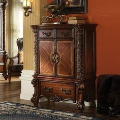 a living room scene with focus on the armoire