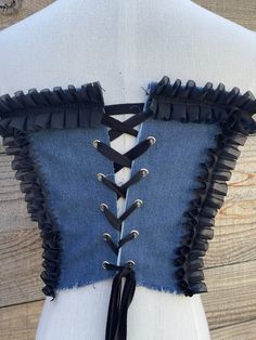 Corset style denim crop top with sequins, ruffles, and kitty cat accent. Stretch Cropped Summer Corset, Cropped Stretch Summer Corset, Summer Cropped Stretch Corset, Cropped Stretch Corset For Spring, Spring Stretch Cropped Corset, Spring Cropped Stretch Corset, Stretch Crop Top With Ruffles, Stretch Ruffled Crop Top, Stretch Ruffled Cropped Crop Top