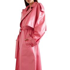 This trench coat is cut from crinkled glossed-leather in a vibrant 'Candy' pink hue and traced with strategically placed snaps - they'll allow you to transform it into a cropped jacket or sleeveless vest, depending on your mood. The triangular buckle is a subtle reference to the 'V' in the brand's name.-pink crinkled glossed-leatherSlips on100% Lamb LeatherEpaulettesStorm flapButton cuffsIncludes matching belt with logo buckle closureCenter back ventIncludes detachable vest with snap buttonTwo s Designer Pink Spring Outerwear, Luxury Pink Outerwear For Spring, Pink Convertible, Leather Trench, Leather Trench Coat, Trench Coats Women, Sleeveless Vest, Pink Candy, Trench Coats