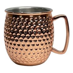 a large metal cup with holes on it's sides and handles, sitting on a white background