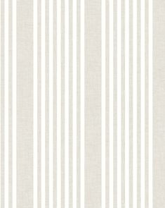 a white striped wallpaper with vertical stripes