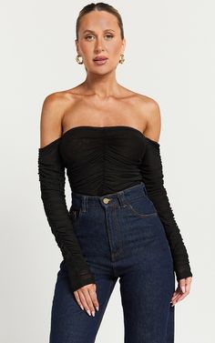 Phoenix Top - Ruched Off Shoulder Top in Black Trendy Stretch Off-shoulder Top For Party, Trendy Fitted Off-shoulder Top For Party, Black Fitted Off-shoulder Top, Trendy Style, Trendy Fitted Black Off-shoulder Top, Chic Ruched Off-shoulder Long Sleeve Top, Chic Long Sleeve Ruched Off-shoulder Top, Trendy Ruched Off-shoulder Top For Spring, Ruched Long Sleeve Off-shoulder Top For Party, Party Long Sleeve Ruched Off-shoulder Top