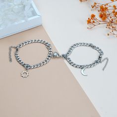 Celebrate your love with our Sun and Moon Couple Bracelets, designed in durable titanium steel. These matching bracelets feature a sun and moon charm, symbolizing the perfect balance between you and your partner. The heart-shaped magnetic clasp adds a special touch, bringing the bracelets together when worn close. Adjustable to fit most wrist sizes, these bracelets make a thoughtful gift for anniversaries, holidays, or just because. Product Information: Material: Titanium Steel Style: Couple, Ma Sun And Moon Couple, Moon Couple, Bf Gift, Style Couple, Bf Gifts, Personalized Couple Gifts, Titanium Bracelet, Couple Bracelets, Design Geometric