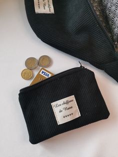 Black corduroy coin purse with zipper. It can be matched with the banana available in the store. It is a good size, you can put your change, credit card and ID or your makeup in it. It also has a black and white cotton lining (may be different from photo) and a zipper. Dimensions: width 14cm, height 10cm * It will be sent to you in tissue paper, in a bubble envelope and by tracked mail ** All my items are handmade by myself in my workshop located in Val d'Oise Black Coin Purse With Zipper Pocket, Casual Pouch With Zipper Closure For Gift, Casual Pouch With Zipper Closure As A Gift, Black Coin Purse With Zipper Pocket As A Gift, Casual Black Coin Purse With Card Slots, Trendy Black Coin Purse For Personal Use, Casual Black Pouch For Gift, Black Casual Coin Purse For Daily Use, Casual Black Coin Purse For Daily Use