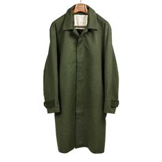 "Named after that prized silhouette created when a balmacaan's cut the right way, a voluminous bell shape that's endlessly wearable. The cloth Kai selected for this season's version is nothing short of ideal, a dense green fabric reminiscent of a Loden wool, but pleasantly soft and fuzzy from the inclusion of alpaca."---Ludwin Details 80% wool, 20% alpaca; dense Austrian cloth from century old mill Raglan coat with button front, hidden placket, button tab cuffs; lined Two hand warmer pockets; si Raglan Coat, Umbrella Shop, The Cloth, Green Wool, Trouser Suits, Green Fabric, Square Scarf, Sport Shorts, Sport Coat