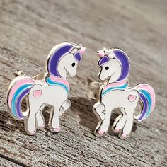 925 Sterling Silver Tiny Unicorn Stud Earrings Metal:925 Sterling Silver Hallmark:925 Width:10 mm Height:13 mm Please choose between pink or purple unicorn >Nickel Free >Pure Silver >Tarnish Resistant >No Allergic reaction >30 days return policy ++Items come in a gift box ready to be gifted Please contact me if you have any questions about the jewelry you are interested in buying. My Shop: https://www.etsy.com/shop/banujewelryusa Follow BANU Jewelry on Facebook, Instagram and othe Whimsical Silver Earrings For Birthday, Unicorn Ears, Unicorn Earrings, Purple Unicorn, Earrings For Girls, Earring Silver, Unicorn Gifts, Earrings Metal, Allergic Reaction