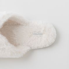 DESCRIPTION Wrap your feet in luxury with Mrs Fluffy Slippers. These beautiful ivory-colored slippers feature adorable MRS embroidery and are crafted with the softest material for ultimate comfort. Elevate your honeymoon experience with these cozy fluffy companions SIZING S: 36-37 US M: 38-39 US L: 40-41 US XL: 42-43 US MATERIALS Faux Fur TPR Sole Comfy Cream Slippers With Soft Detail, Cream Colored Comfy Slippers With Soft Detailing, Comfy Soft Cream Slippers, Comfy Cream Soft Slippers, Cream Soft Comfy Slippers, Soft Cream Round Toe Slippers, Comfy White Slippers With Soft Texture, Comfy Cream Indoor Slippers, Cream Comfy Indoor Slippers