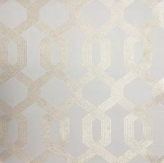 a white and gold wallpaper with an abstract design