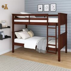 the bunk bed is made up and ready to be used as a child's room