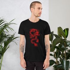 "Japanese Dragon Shirt | Red Dragon T-Shirt | Traditional Japan Dragon Art Drawing Tee | Aesthetic Grunge Clothing | Unisex T-Shirt A Japanese dragon, also known as ryū (ryu) or tatsu (龍 or 竜, \"dragon\") is a mythical animal from Japan. Like other creatures called dragons, the Ryū is a big, fantastic animal that looks similar to a serpent, and is related to the Chinese lóng and the Korean yong. You've now found the staple t-shirt of your wardrobe. It's made of a thicker, heavier cotton, but it' Red Band Merch Shirt With Screen Print, Red Short Sleeve Band Merch Top, Red Band Merch T-shirt For Streetwear, Red Relaxed Fit T-shirt With Graphic Design, Red Streetwear T-shirt With Front Print, Red Short Sleeve T-shirt With Screen Print, Red Short Sleeve T-shirt With Front Print, Red Band Merch T-shirt Pre-shrunk, Red Pre-shrunk Band Merch T-shirt