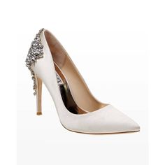 white high heel shoes with crystal decoration on the toe and stilfe heels in satin fabric