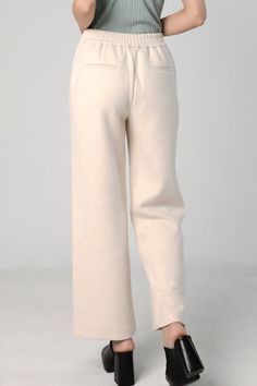 Stay Comfortable and Stylish with our Straight Leg Sweatpants Perfect for living in, these cozy sweatpants are also stylish. They're warm enough to be worn out in cool weather. The raw cut side seam elongates your legs. Features a wide waist band with drawstring and side pockets. Style #: WWSI901 Casual Wide Leg Pants For Fall Loungewear, Winter Full-length Pants With Ribbed Waistband, Relaxed Full-length Sweatpants For Fall, Relaxed Full Length Sweatpants For Fall, Comfy Pants With Elastic Waistband For Fall, Relaxed Fit Solid Wide Leg Pants For Winter, Winter Wide Leg Pants Solid Relaxed Fit, Winter Wide Leg Relaxed Fit Pants, Chic Relaxed Fit Wide Leg Pants For Winter