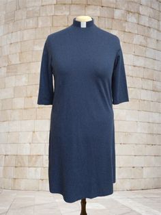 A perfectly modest option. Ideal if you prefer a little more wiggle room in your clothes! It is the Tapered Dress without the back darts. This dress does not have pockets nor the option for pockets. It is available only in Cotton. Click for information on: Sizing Collar Sleeves Fabric Length Fitted Midi Dress With Side Pockets For Work, Fitted Blue Dresses With Side Pockets, Fitted Midi Dress With Side Pockets, Modest Fitted Dress With 3/4 Sleeves, Loose Fit Dress, Loose Fitting Dresses, Fit Dress, High Neck Dress, Loose Fitting