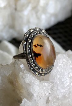 Art Deco 1920s Sterling Silver Marcasite Orange Banded Agate Vintage Ring Vintage Oval Cabochon Gemstones, Vintage Round Cabochon Gemstones, Vintage Agate Oval Cabochon Jewelry, Vintage Opal Ring With Oval Cabochon, Vintage Opal Cabochon Ring For Collectors, Vintage Agate Gemstone Jewelry, Vintage Collectible Opal Ring With Oval Cabochon, Antique Oval Cabochon Opal Ring, Antique Opal Ring With Oval Cabochon