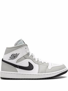 the air jordan 1 mid sneaker in white and black