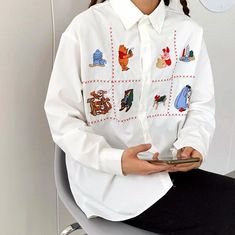 Cartoon Animal Embroidery Long Sleeve Shirt sold by Tony Moly Store on Storenvy Long Sleeve Shirt With Cartoon Print For Spring, Embroidered Collared Winter Tops, Long Sleeve Cartoon Print Relaxed Fit Shirt, Relaxed Fit Long Sleeve Shirt With Cartoon Print, White Embroidered Long Sleeve Shirt, White Embroidered Button-up Shirt, White Cotton Shirt With Cartoon Print, White Collared Embroidered Shirt, White Embroidered Collared Shirt