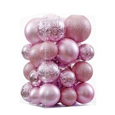 a clear box filled with pink and silver ornaments