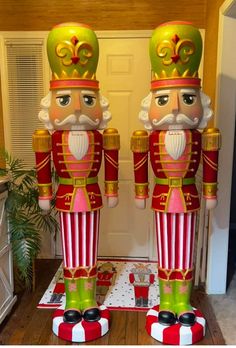 two large nutcrackers standing next to each other