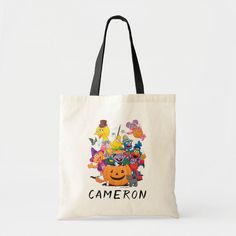 a tote bag with cartoon characters and the word cameon in black letters on it