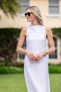 Meet Jane - an elegant take on the perfect 1960s silhouette with a touch of 90s modernism. Easy, timeless and the perfect dress to showcase your most treasured accessories, she is a must for every wardrobe. Made of 100% silk dupioni, this dress features a slight a-line cut, hits mid-ankle & has a zipper closure in the back. From New York with a BB pump to Harbour Island with a jeweled flat, this dress effortlessly combines style & comfort. Dupioni silk is a luxurious handloom textile known for its textured, shimmering quality and features natural irregularities and slubs. The fabric's characteristic variations in color and texture add to its unique charm and appeal. Sizing Info: Fits true to size. XS (00-0), S (2-4), M (6-8), L (10-12), XL (14) XS S M L XL US Dress Size 00-0 2-4 6-8 10-12 Structured A-line Summer Dress, Summer Evening H-line Midi Dress, Classic Summer Mini Dress For Daywear, Classic Summer Mini Dress For Work, Spring Formal H-line Dress, Elegant Lined Mini Dress, Classic Summer Workwear Mini Dress, Chic Lined Dresses For Daywear, Fitted H-line Mini Dress For Summer