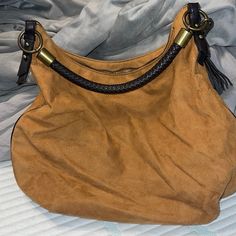 Nwot Nine West Tan Suede With Brown Leather Rope Handle And Brown Leather Tassel And Mirror Inside With Card Holder Two Pockets And A Zipper Pocket Perfect Condition Never Been Used Really Cute Medium To Large Side Interior Is Perfect Too Smoke Free Home Casual Brown Shoulder Bag With Tassels, Brown Bags With Leather Handles, Chic Brown Hobo Bag With Tassels, Beige Fringed Hobo Bag For Daily Use, Beige Fringe Hobo Bag For Daily Use, Brown Bag With Leather Handles For Fashion, Beige Tassel Shoulder Bag For Everyday, Elegant Brown Bags With Tassels, Elegant Brown Bag With Fringe