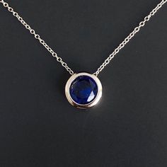 Solid Sterling Silver Sapphire birthstone pendant, with strong Sterling Silver 16 - 18 inch adjustable chain. Sapphire Necklace, Sterling Silver Necklace, Silver Pendant, September Birthstone necklace, September birthday gift. Christmas gift 💎Pendant thickness: 5mm 💎Pendant diameter: 10mm 💎Chain length: Adjustable 16 - 18 inch  BIRTHSTONE SET designed by Chenny from our studio in Jersey CI. This classic birthstone range includes matching necklace, earrings and charm bracelet making it perfect Sapphire Birthstone Necklace In Sterling Silver, Sapphire Round Pendant Necklace For Anniversary, Sapphire Pendant Crystal Necklace As Gift, Sapphire Pendant Crystal Necklace For Gift, Adjustable Bezel Set Necklace For Gifts, Bezel Setting Necklaces As Gift, Round Bezel Setting Necklace For Gift, Round Pendant Necklace With Bezel Setting As Gift, Sapphire Necklace With Adjustable Chain For Gift