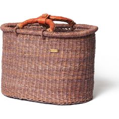 a woven basket with an orange wooden handle